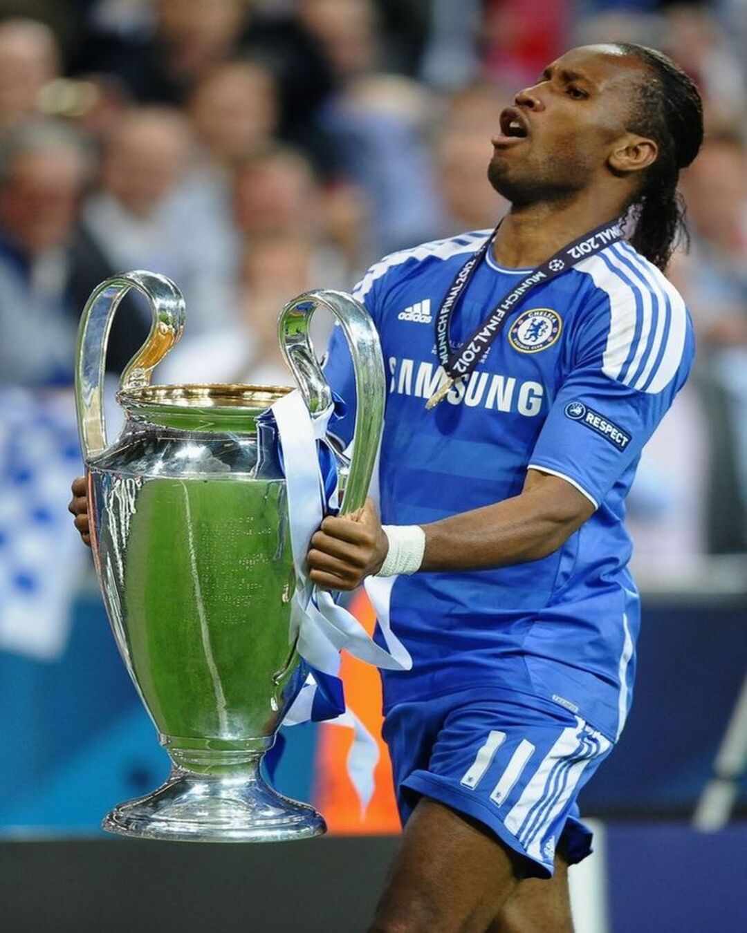 Didier Drogba wearing Chelsea 2011-2012 home kit