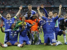 Chelsea's players wearing Chelsea 2011-2012 home kit