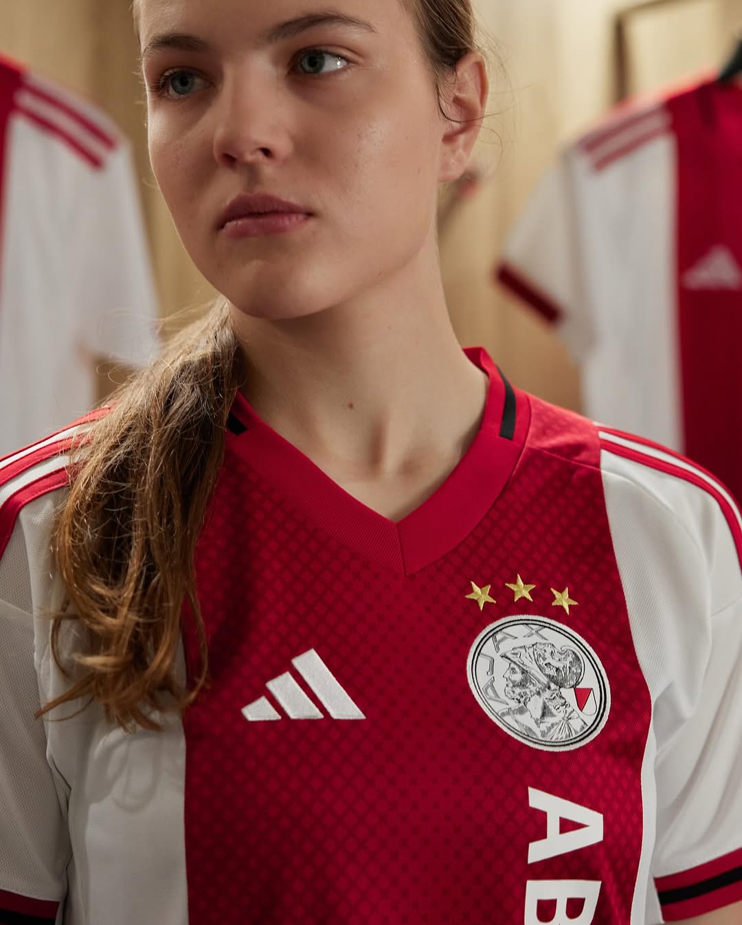 Lotte Keukalaar wearing Ajax 2025-2026 home kit