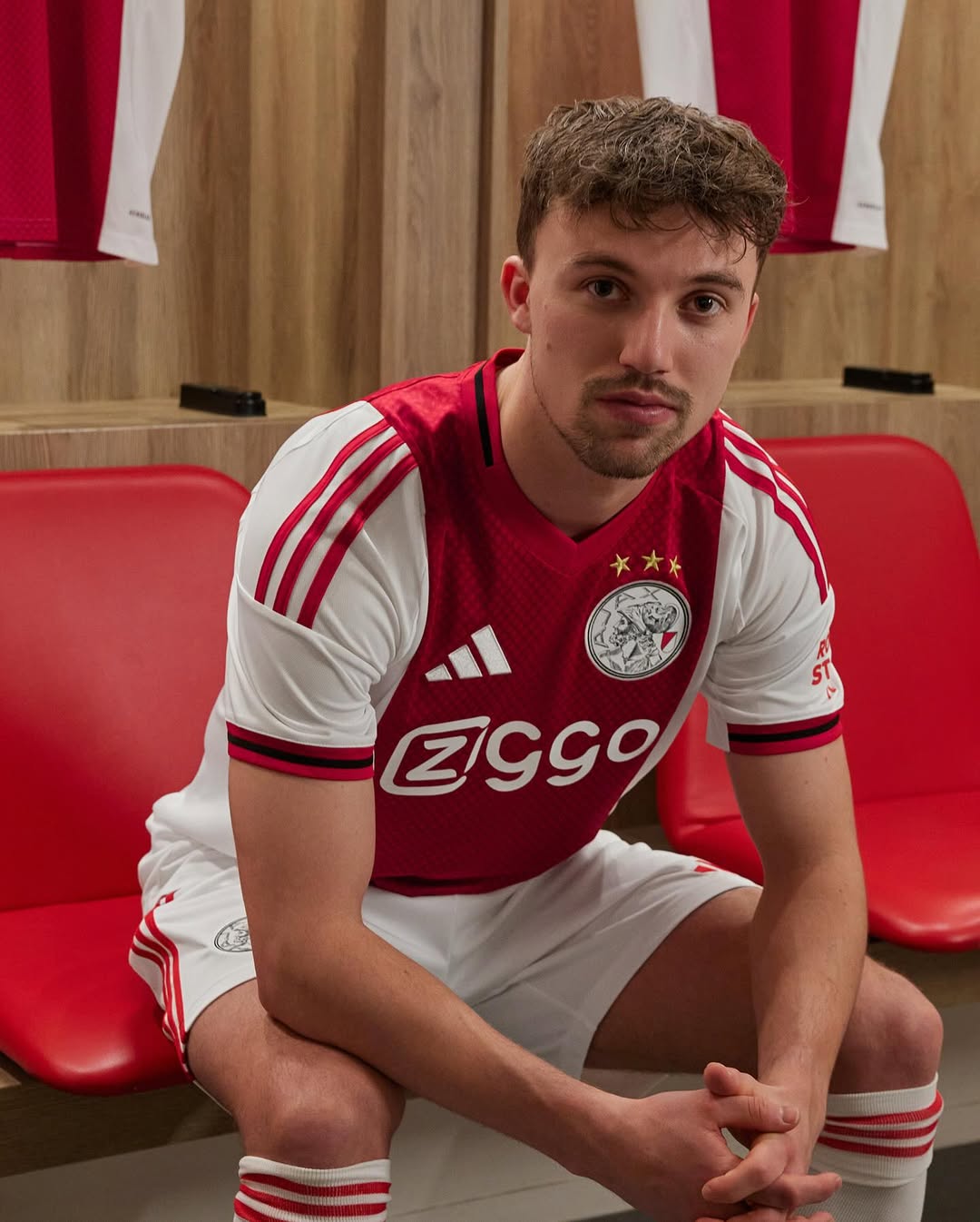 Youri Regeer wearing Ajax 2025-2026 home kit