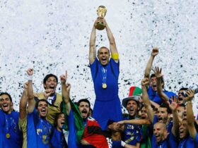 Captain Cannavaro lifting the World Cup trophy wearing Italia 2006-2007 Home Kit