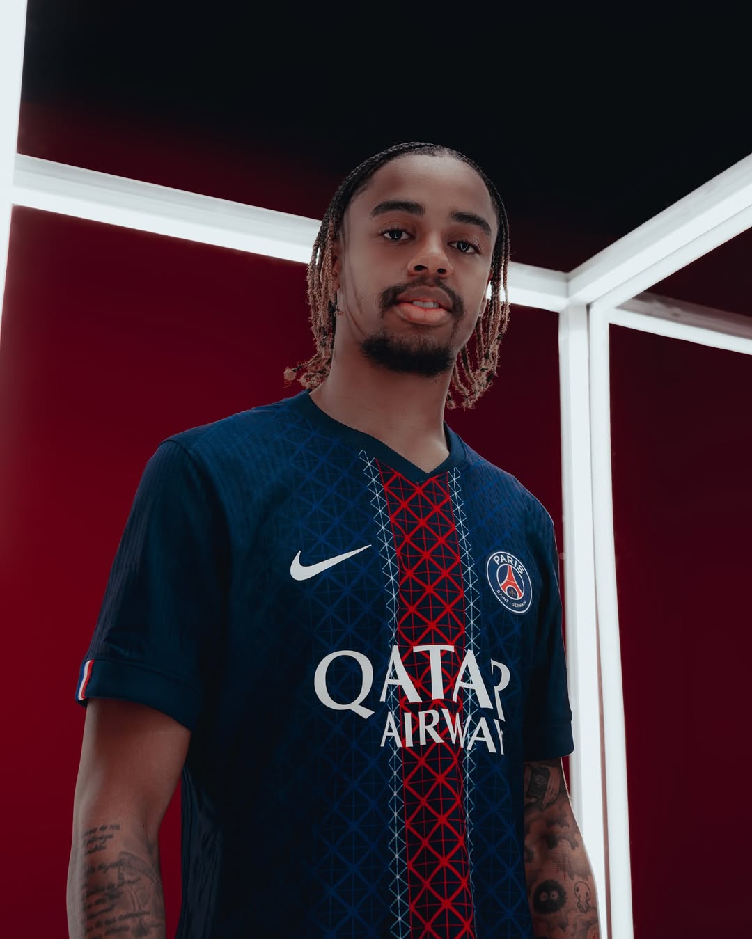 Bradley Barcola wearing Paris Saint-Germain 2025-2026 Home Kit