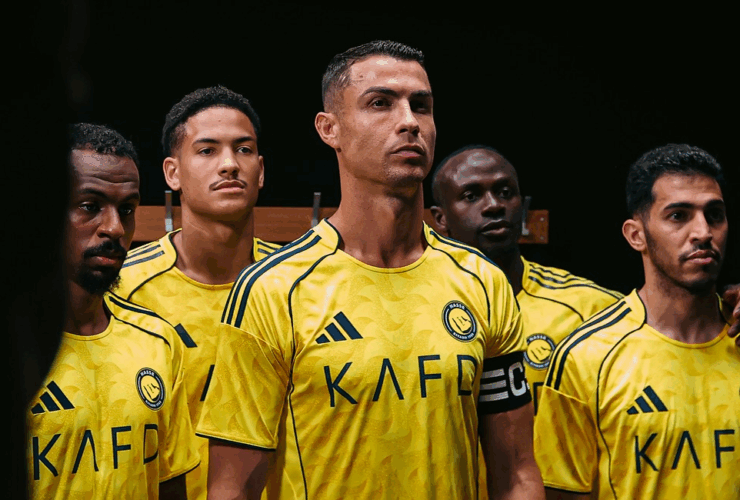 Cristiano Ronaldo and other Al Nassr players wearing Al Nassr home kit 2025-2026