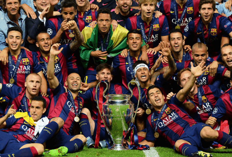 The entire Barcelona 2014-2015 team celebrating the Champions League winning wearing Barcelona 2014-2015 home kit