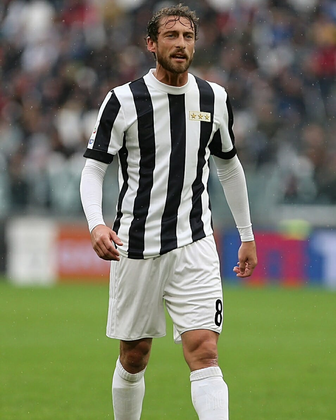 Claudio Marchisio wearing Juventus 120th Anniversary home jersey