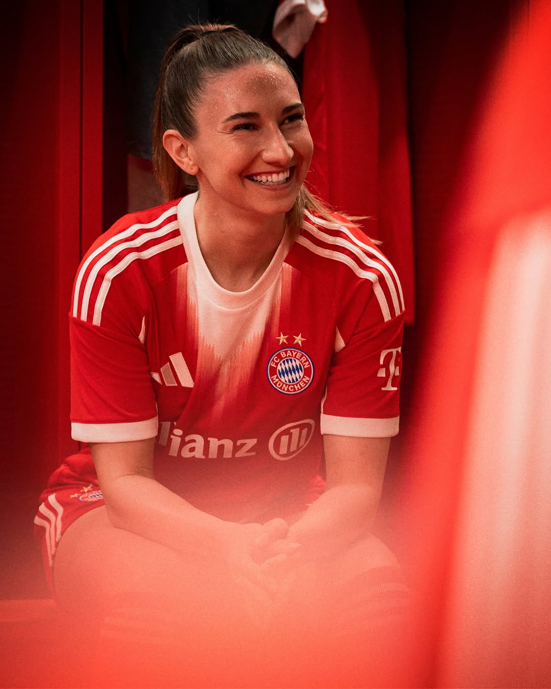woman player wearing FC Bayern Munich 25-26 first kit