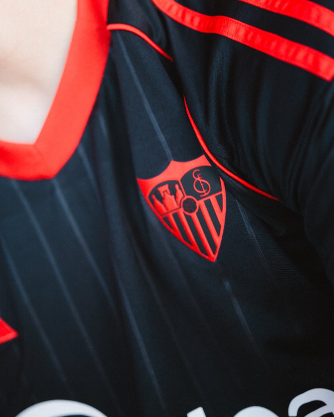 Sevilla FC 2025-2026 third kit zoom on Sevilla crest