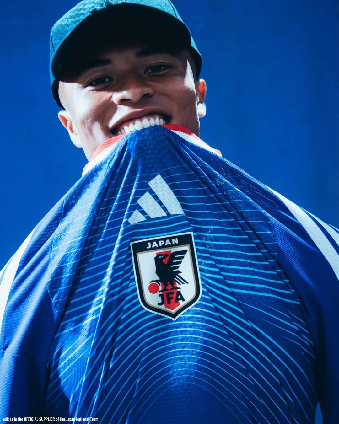 Joel Futija wearing Japan World Cup 2026 home kit