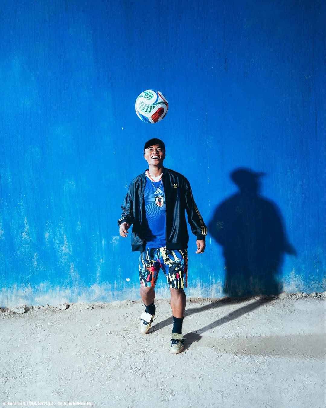 Joel Futija wearing Japan World Cup 2026 home kit