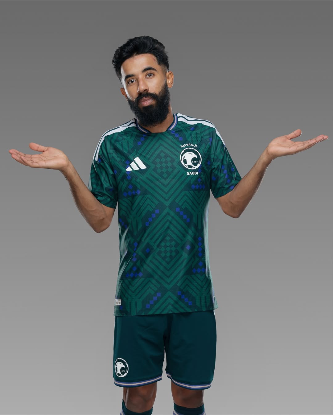 Player of Saudi Arabia wearing Saudi Arabia 2026 home kit