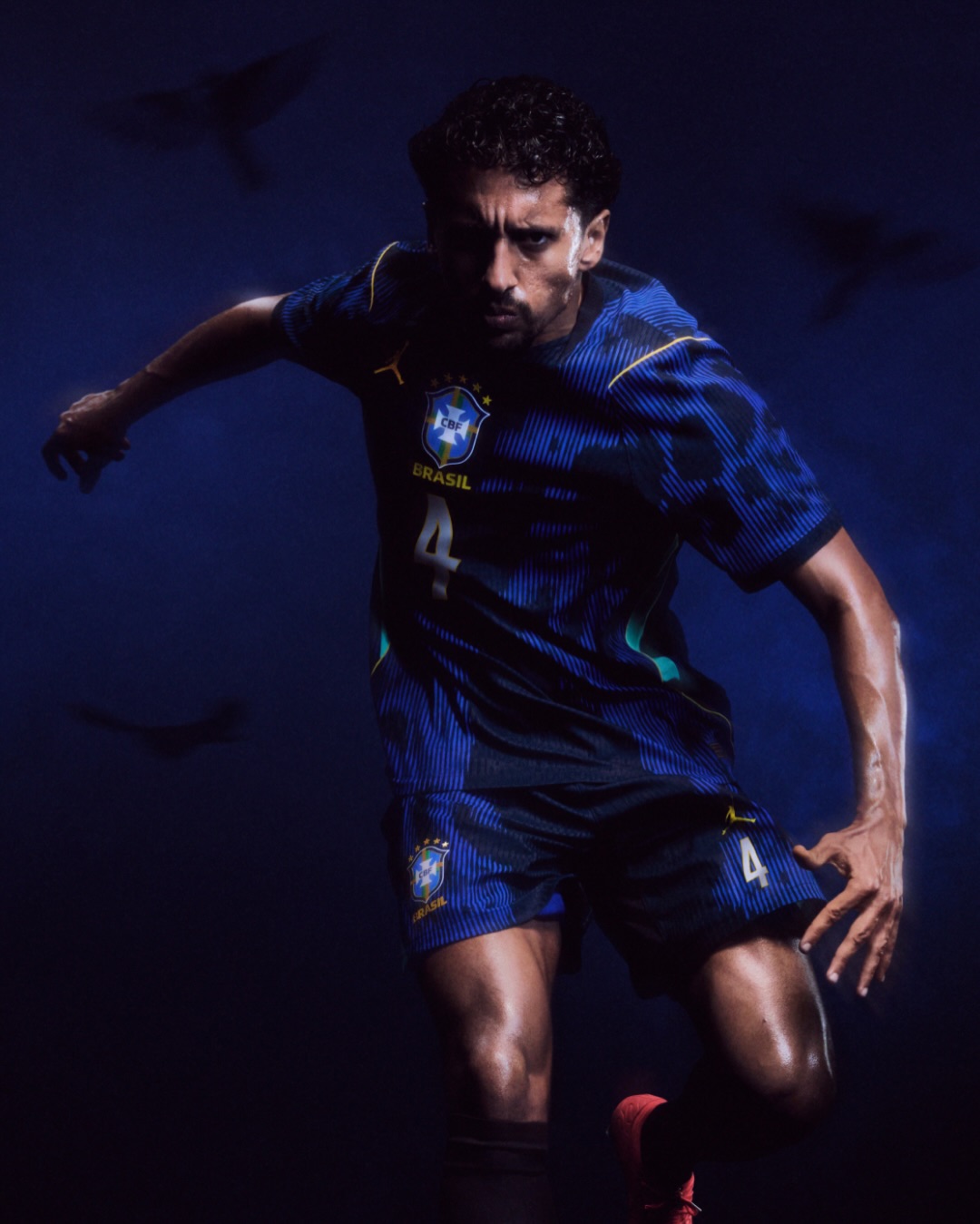 Marquinhos wearing Brazil 2026 away kit
