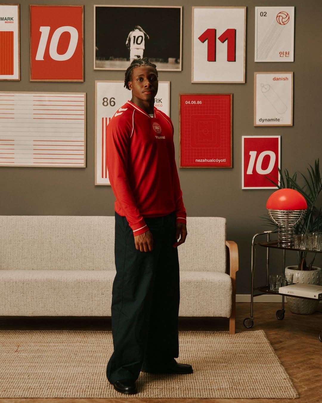Patrick Dorgu wearing Denmark 2026 home kit