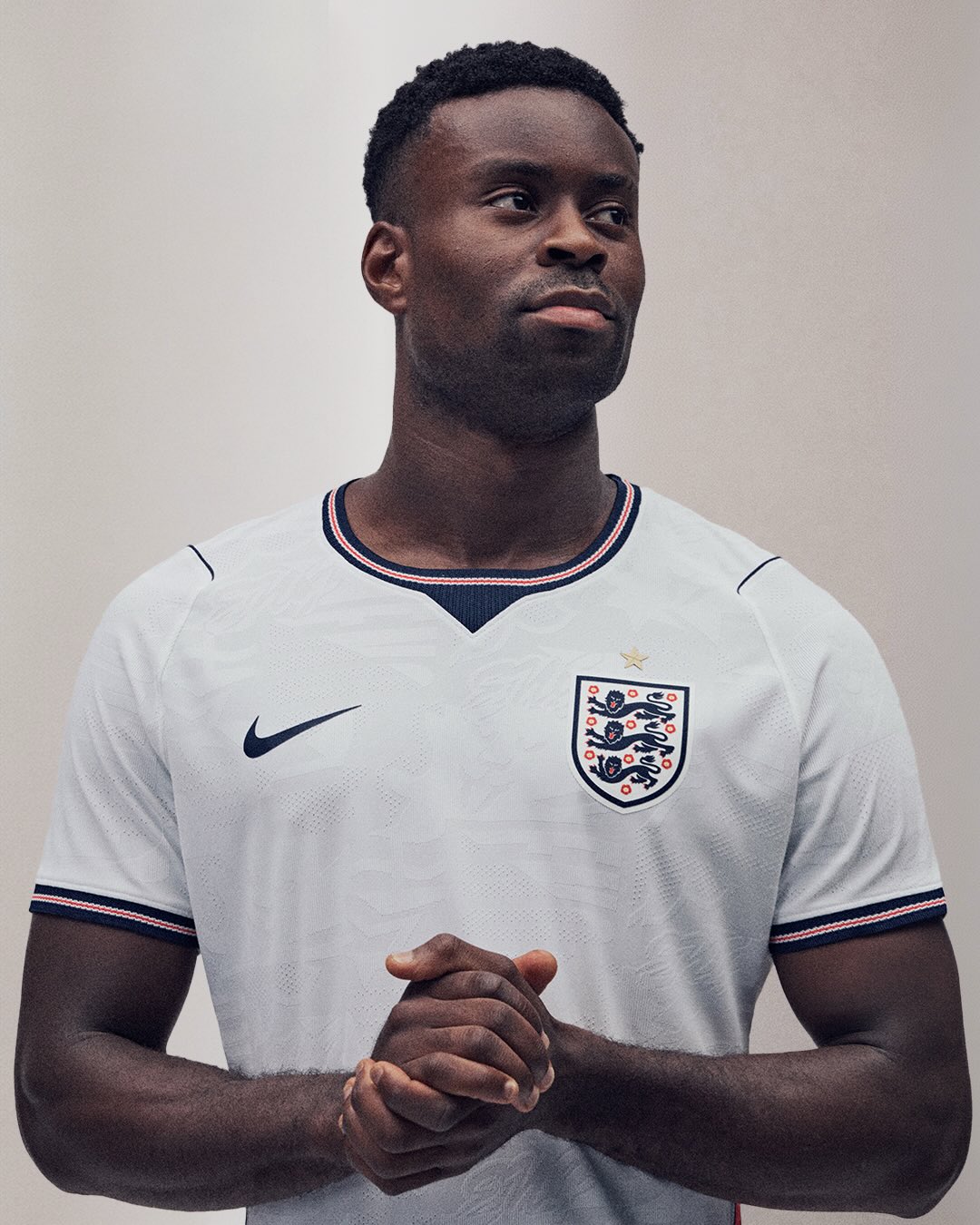 Player of England wearing 2026 world cup home kit